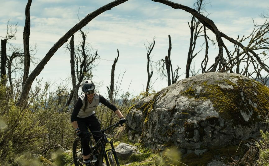 a man mountain biking in cascades trail in the lake mountain alpine resort