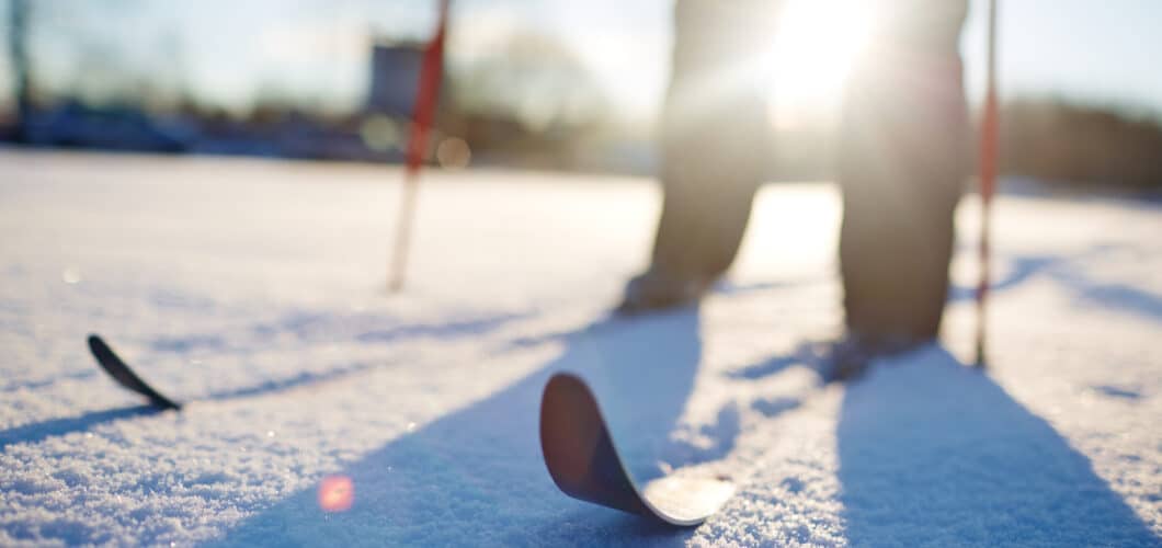 A person cross country skiing in the snow