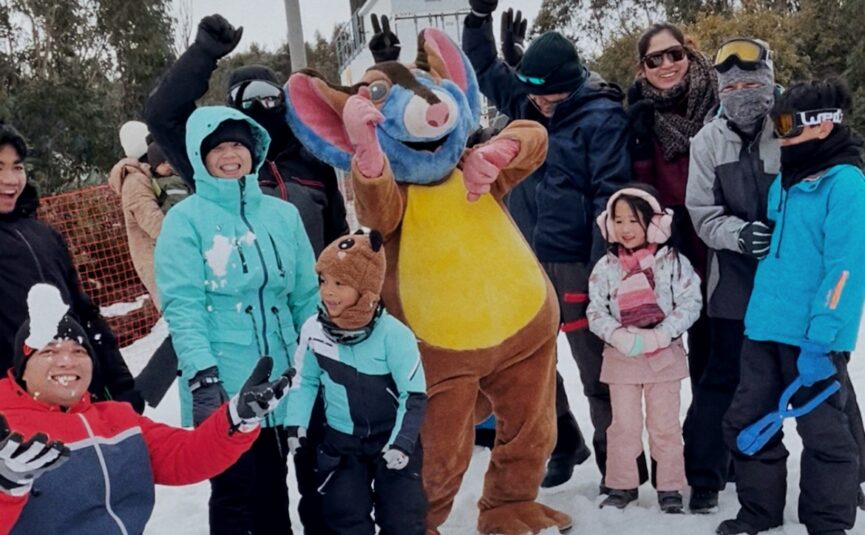Lenny the Leadbeater Alpine Possum, our resort mascot having fun with guests in the snow!